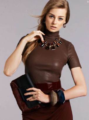 Description: 3. Leather top, $500, and belt, $180, both by Scanlan& Theodore; skirt, $99, by Trenery; earrings, $69, by Peter Lang; necklace, $39.99, by Lovisa; bangles, $95 each, by Elke; ring, $50, by Peter Lang; clutch, $149, by Marcs.