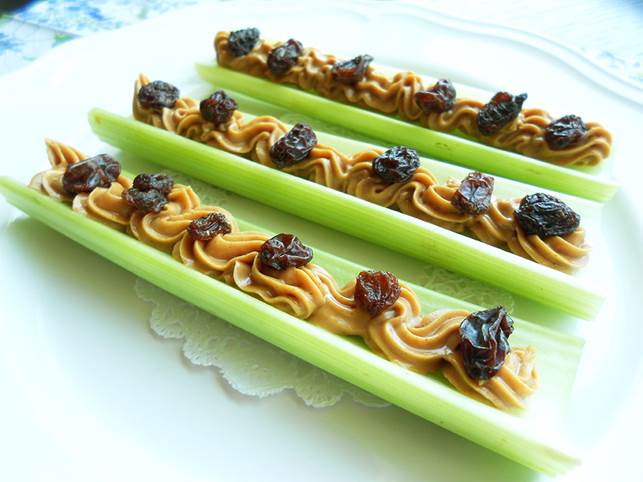 celery stick with peanut butter and raisins