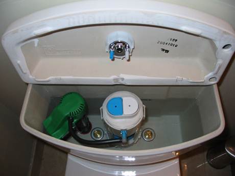 Description: Toto Aquia dual flush toilet 