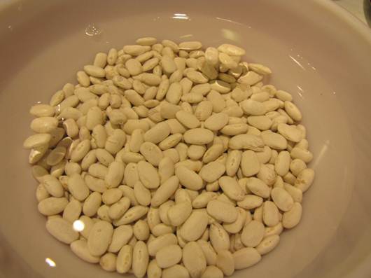 Description: Drain soaked beans and transfer to a large pan