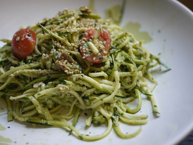 Serve pasta topped with remaining walnut pesto, parsley leaves and walnuts