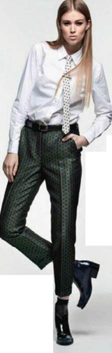 Description: Cotton shirt, Silk jacquard trousers (worn throughout), Leather boots, Silver earrings (worn throughout), Cotton tie, and silver tie pin, Cotton socks