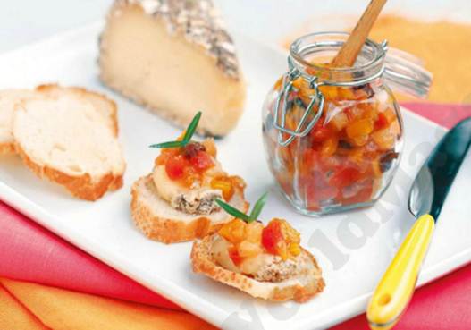 Description: Blush Cheese Plate with Tropical Fruit and Wine Chutney