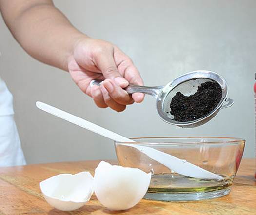 Description: Mix the egg white in a bowl and add in a ¼ cup of used coffee grounds
