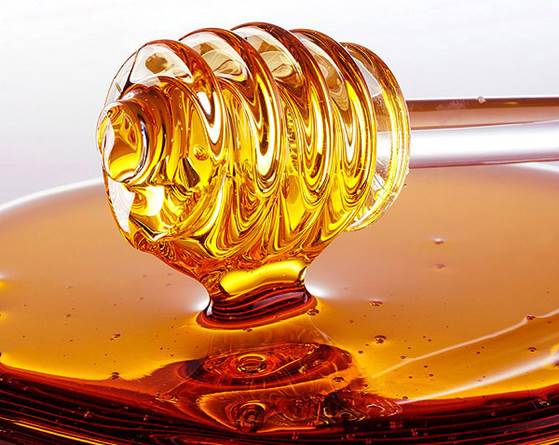 Description: Add honey to the mixture.